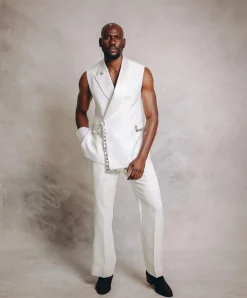 An Ivory White Monochrome “Jilted” Trio Lapel Armless Jacket With Swarovski Crystal Stone Details