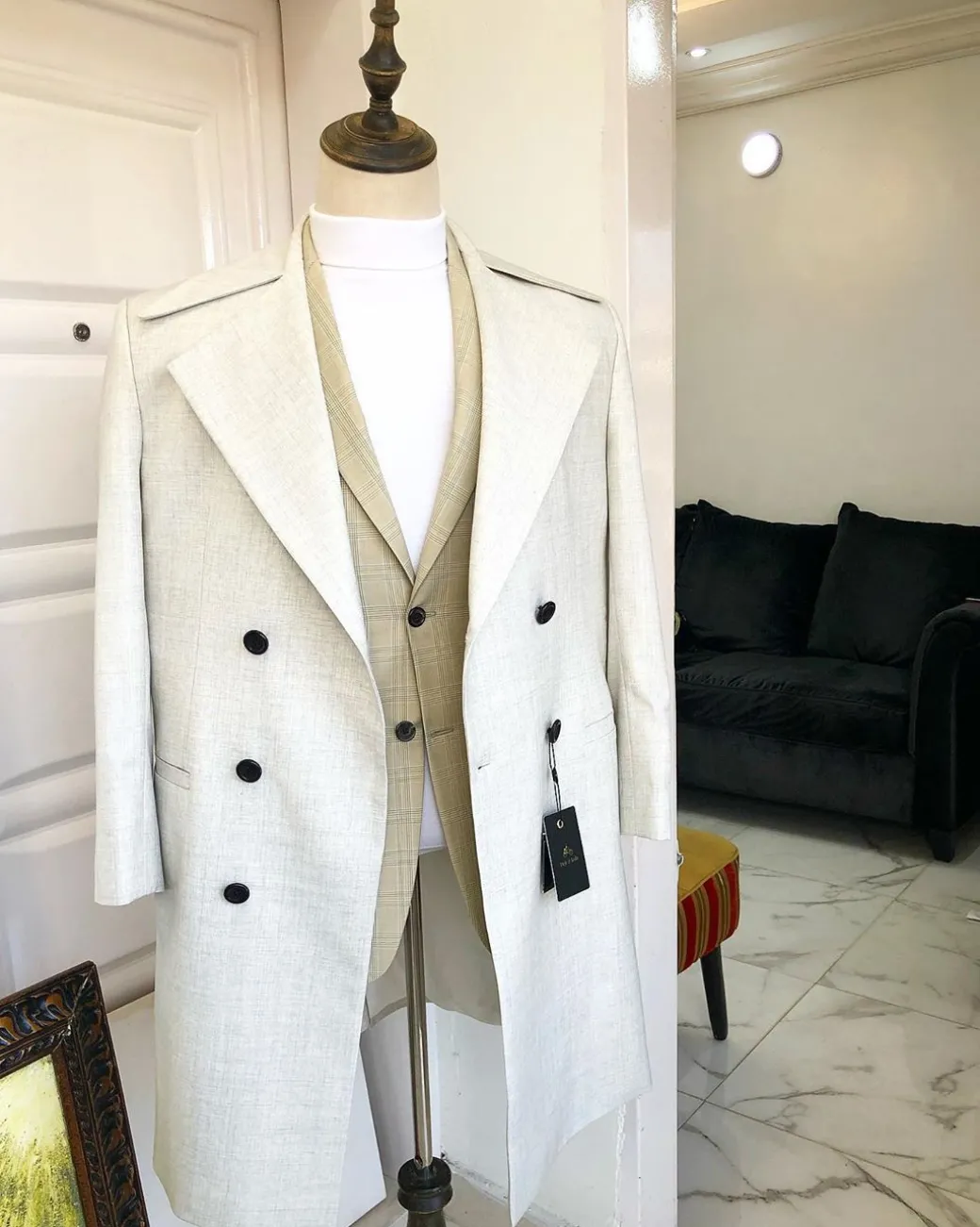 An Ivory White “No Longer At Ease” Suit