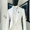 An Ivory white, notch lapel, infinity “maze” line Japanese patterned jacquard suit