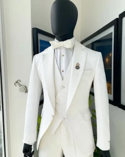 An Ivory white, notch lapel, infinity “maze” line Japanese patterned jacquard suit