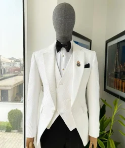 An Ivory white, notch lapel, infinity “maze” line Japanese patterned jacquard suit.