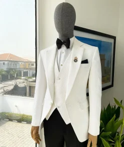 An Ivory white, notch lapel, infinity “maze” line Japanese patterned jacquard suit.