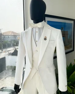 An Ivory white, notch lapel, infinity “maze” line Japanese patterned jacquard suit