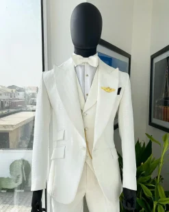 An Ivory White, Peak Lapel, Infinity Line And Square Patterned Jacquard Suit