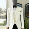 An Ivory White, Peak Lapel, Infinity Line And Square Patterned Jacquard Suit