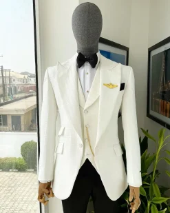 An Ivory White, Peak Lapel, Infinity Line And Square Patterned Jacquard Suit