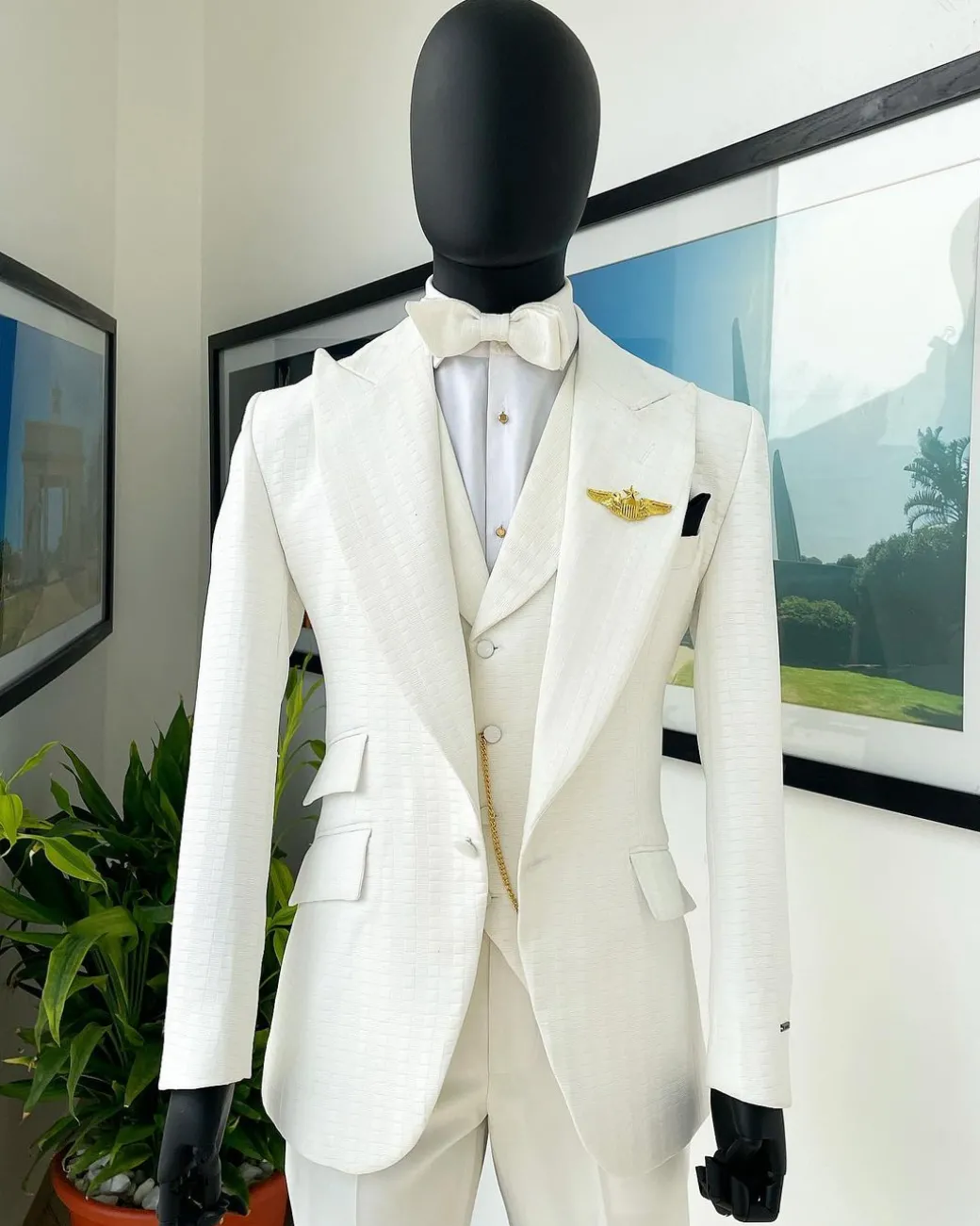 An Ivory White, Peak Lapel, Infinity Line And Square Patterned Jacquard Suit