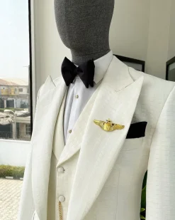 An Ivory White, Peak Lapel, Infinity Line And Square Patterned Jacquard Suit