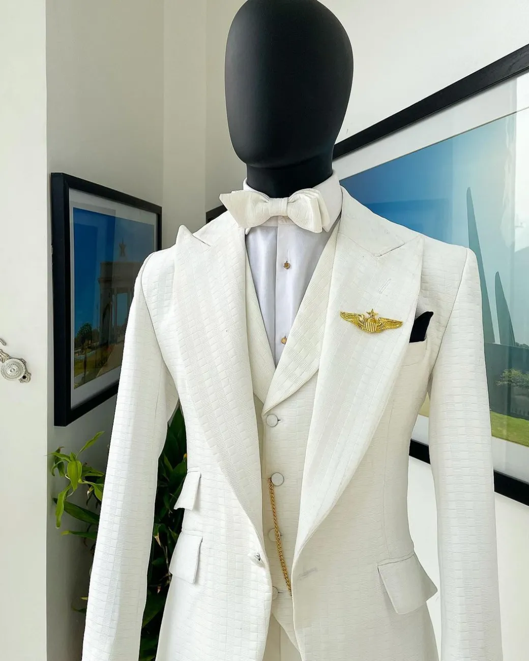 An Ivory White, Peak Lapel, Infinity Line And Square Patterned Jacquard Suit
