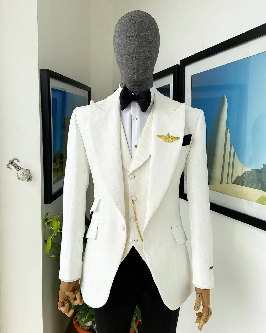 An Ivory White, Peak Lapel, Infinity Line And Square Patterned Jacquard Suit