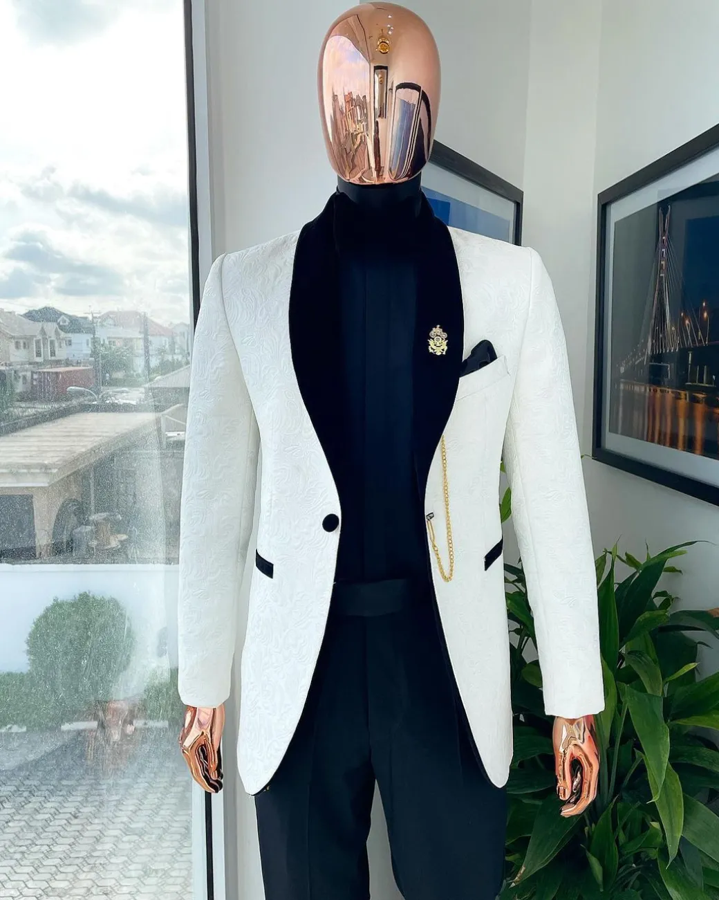 An Ivory white shawl lapel floral jacquard suit.