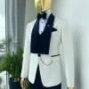 An Ivory white shawl lapel square pattern jacquard tuxedo suit.