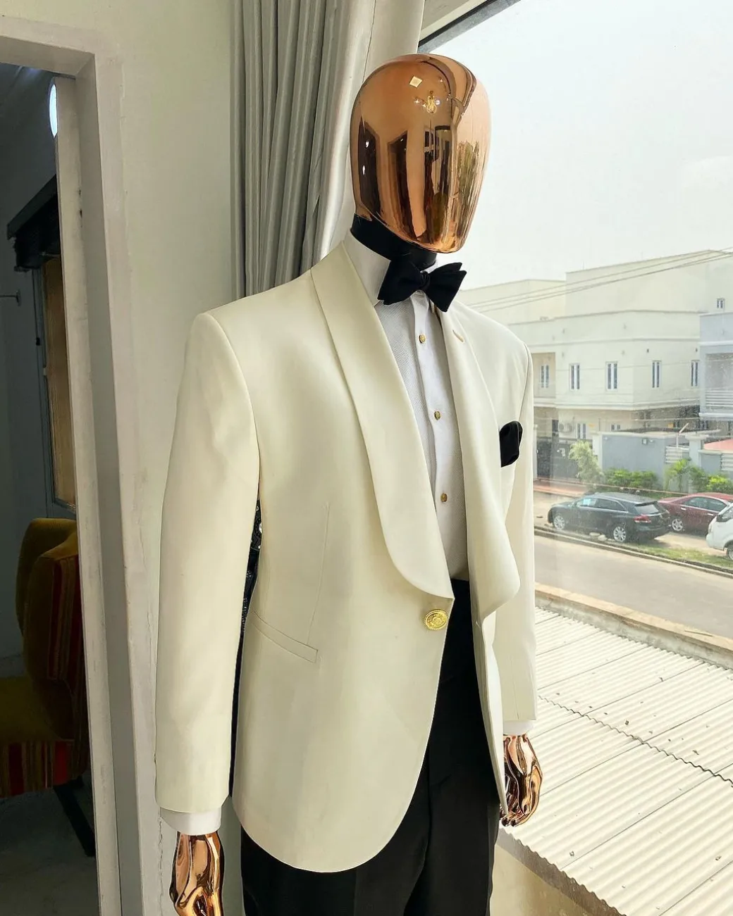 An Ivory White Shawl lapel tuxedo suit