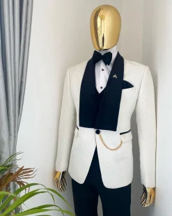 An Ivory white shawl lapel square pattern jacquard tuxedo suit.
