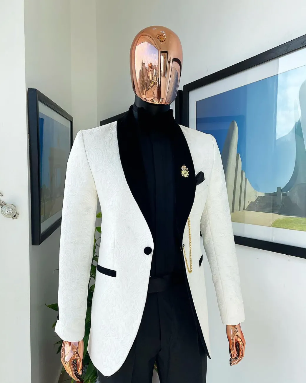 An Ivory white shawl lapel floral jacquard suit.