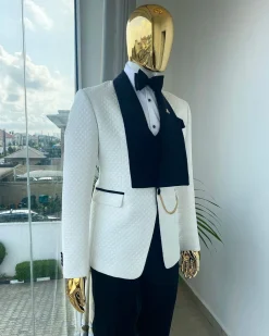 An Ivory white shawl lapel square pattern jacquard tuxedo suit.