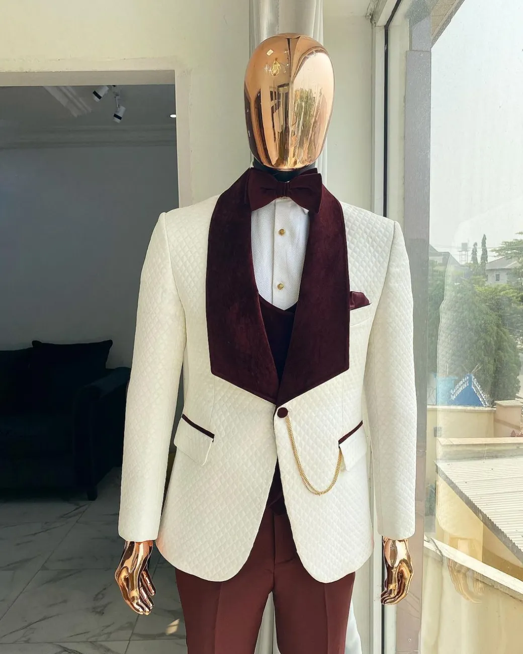 An Ivory white Square pattern shawl lapel Jacquard tuxedo suit