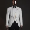 An Ivory white, swollen floral jacquard shawl lapel tuxedo suit