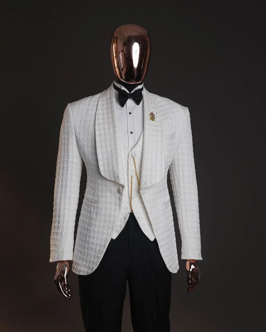 An Ivory white, swollen floral jacquard shawl lapel tuxedo suit