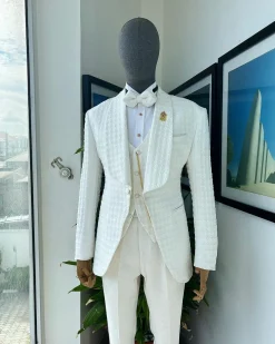 An Ivory white, swollen floral jacquard shawl lapel tuxedo suit.