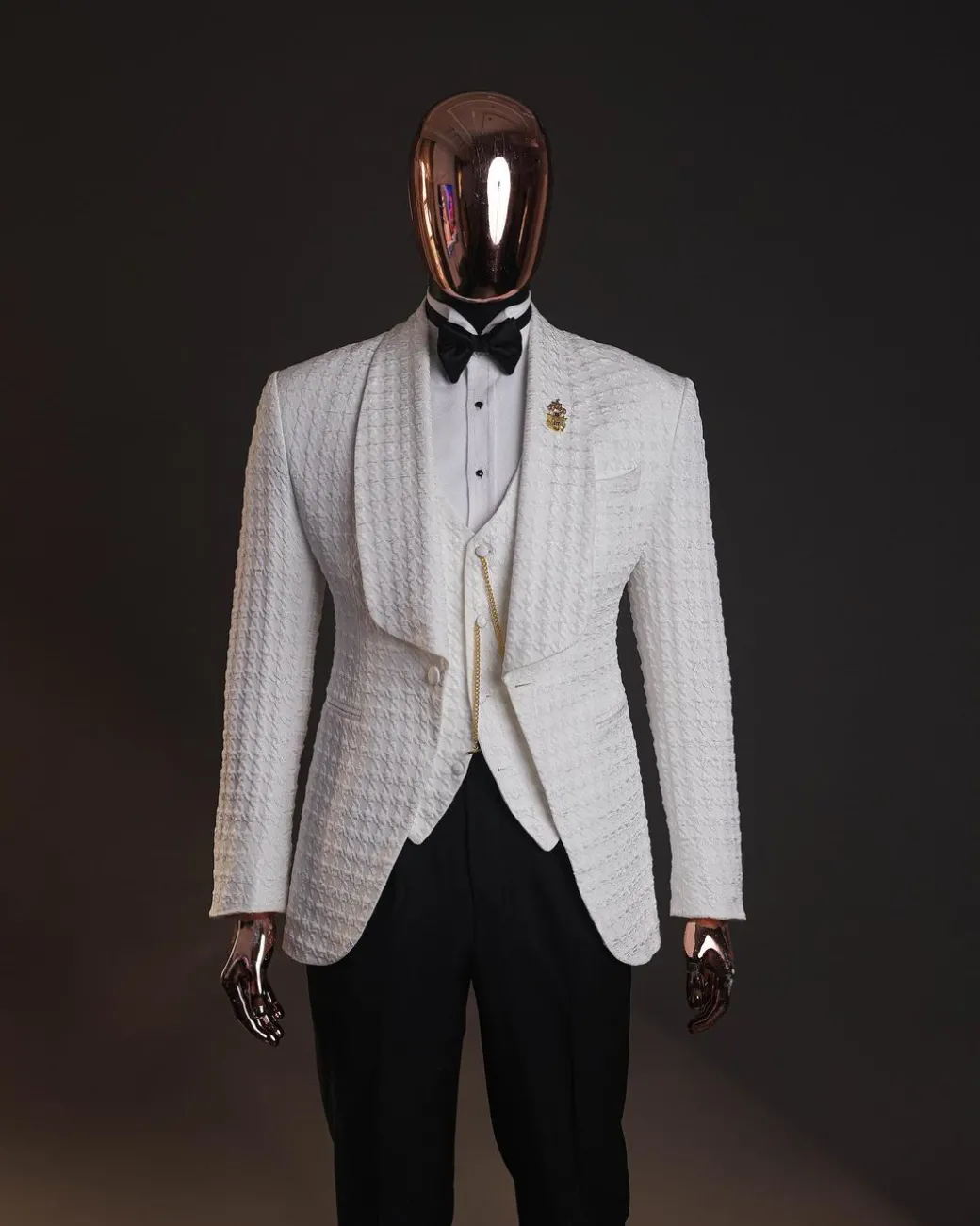 An Ivory white, swollen floral jacquard shawl lapel tuxedo suit