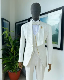 An Ivory white, swollen floral jacquard shawl lapel tuxedo suit.