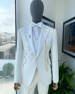An Ivory white tear drop pattern jacquard hand picked peak lapel Suit.