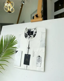 An Ivory white with front flap, paisley detailing African Kaftan and sokoto
