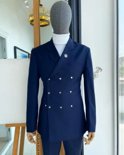 An Navy blue “ibiza” wrap suit with snap buttons detailing