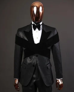 An “Octopus” black inverted square patterned metallic jacquard tuxedo with intersected black velvet peak lapel suit