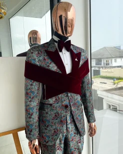 An “octopus” floral paisley tuxedo with intersected mahogany red soaked Italian velvet peak lapel suit