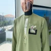 An Olive green and paisley flap detailing african traditional senator kaftan native.