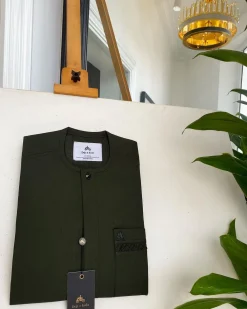 An Olive Green, Tiny Flap with Swarovski button details African traditional senator kaftan native.