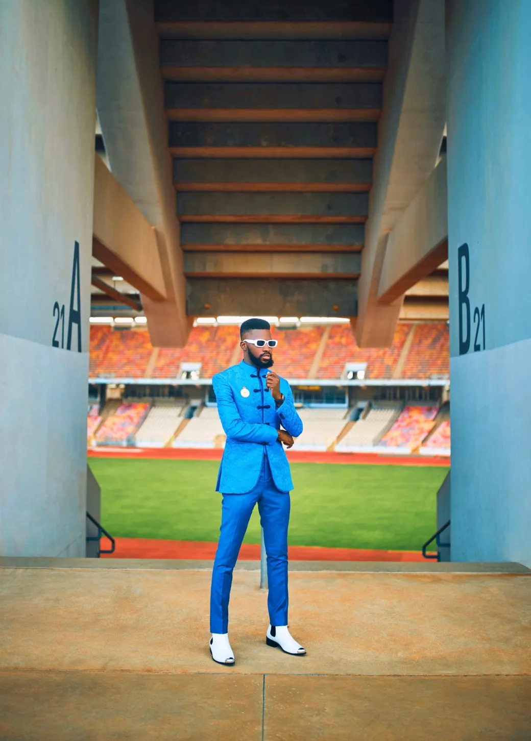 An Olympic blue mandarin floral safari suit