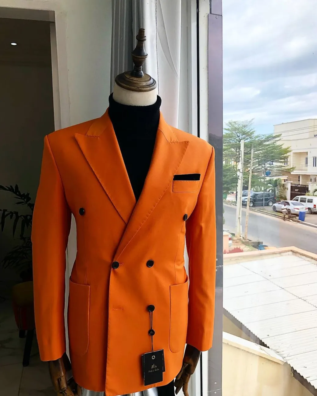 An “Orange” Peak Lapel, Hand knitted, double-breasted Peak Lapel suit
