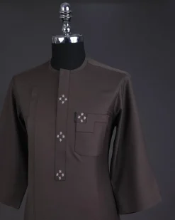 An Uber brown, front flap with connected stars, 3/4 sleeve African senator kaftan native.