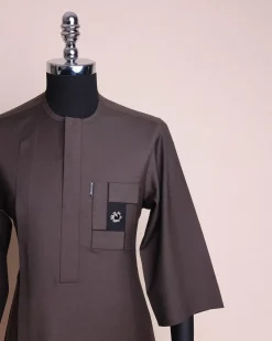 An Uber brown, front flap, connected mazed rectangle, 3/4 sleeve African senator kaftan native.