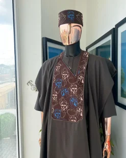 An Umber Brown, AI connected iron-man maze embroidery details agbada, mixed Swarovski buttons on 3/4 sleeve kaftan & sokoto