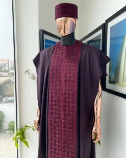 An Umber brown, connected square embroidery design with matching black and brown Swarovski stone details agbada, matching hat, buba & sokoto