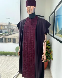 An Umber brown, connected square embroidery design with matching black and brown Swarovski stone details agbada, matching hat, buba & sokoto