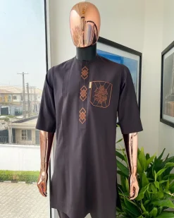 An umber brown, 3D precision anchor embroidery flap and pocket detailing African traditional senator Kaftan native