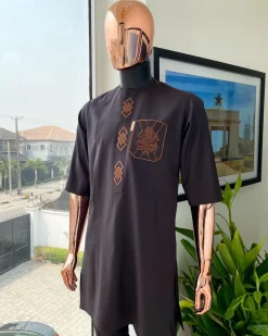 An umber brown, 3D precision anchor embroidery flap and pocket detailing African traditional senator Kaftan native