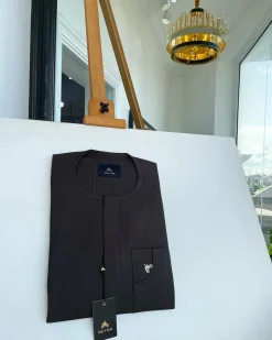 An Umber Brown, Front Flap and Undulating Lift Patch Pocket Detailing Senator Kaftan Native.