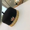 Black African Traditional Hat With Gold Adornment
