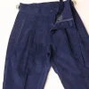 Gurkha trousers with pleats, double side strap buckles, slanted front welt pockets, and a back patch pocket.