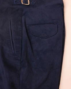 Gurkha trousers with pleats, double side strap buckles, slanted front welt pockets, and a back patch pocket.
