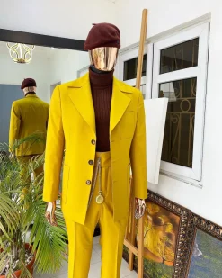 The “ Festac 77” mustard yellow 3 button safari suit