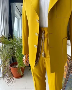 The “ Festac 77” mustard yellow 3 button safari suit