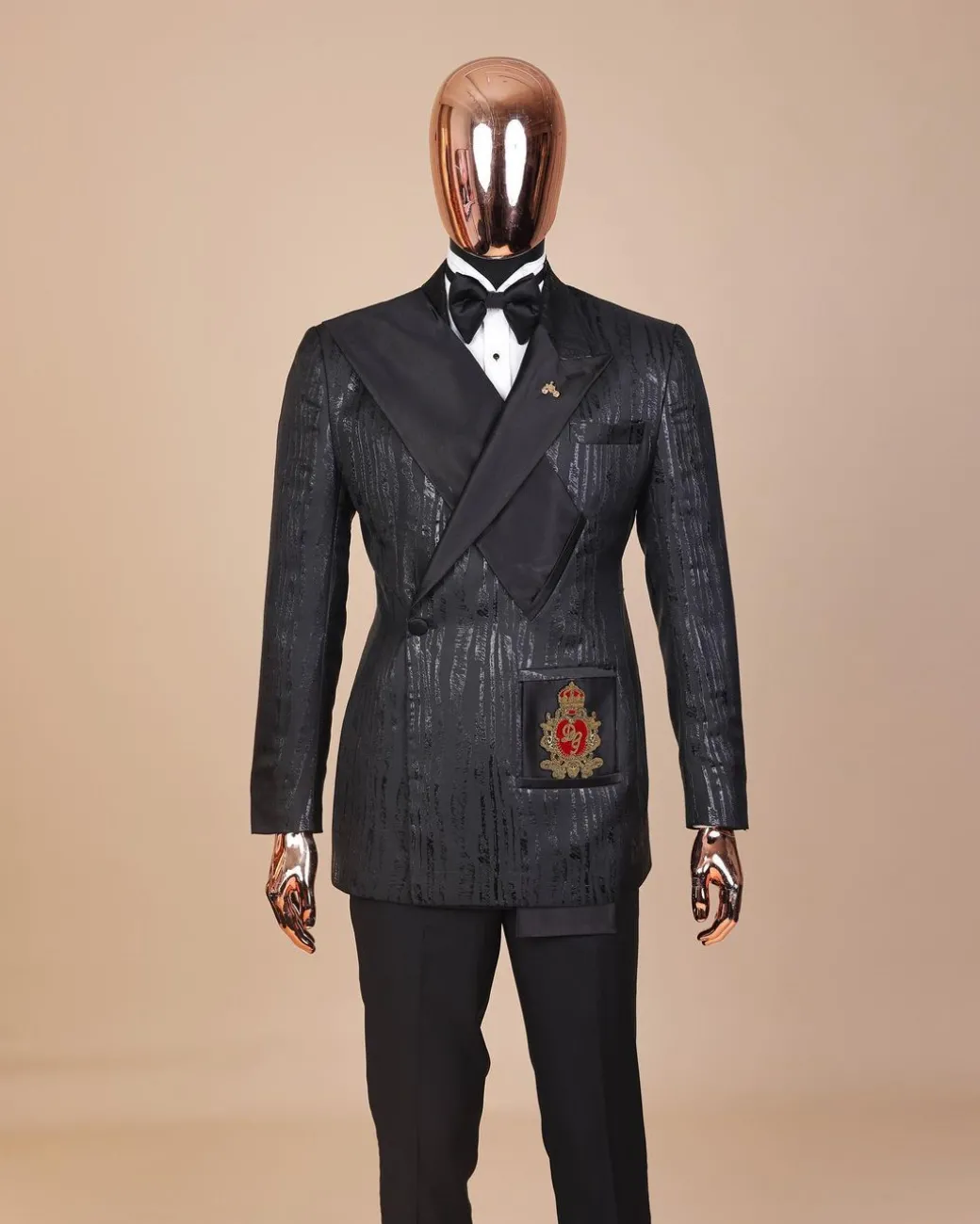 The “Da Vinci” charcoal black, metallic jacquard, single lapel, mid cut intersect strap tuxedo suit.