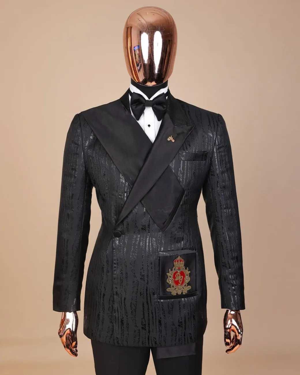 The “Da Vinci” charcoal black, metallic jacquard, single lapel, mid cut intersect strap tuxedo suit.